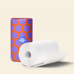 Rolls of Who Gives a Crap paper towel.